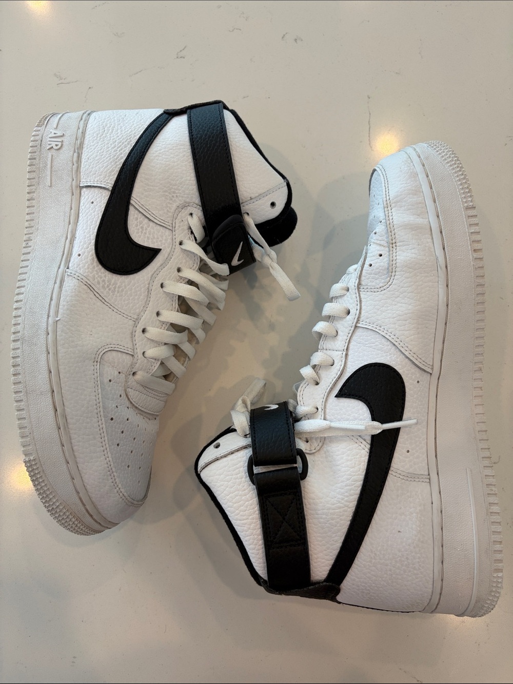 Nike Men’s Air Force 1 High ‘07 White High-Top Sneakers with Black Swoosh